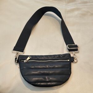 Sleek Black Crossbody Bag with Silver Accents